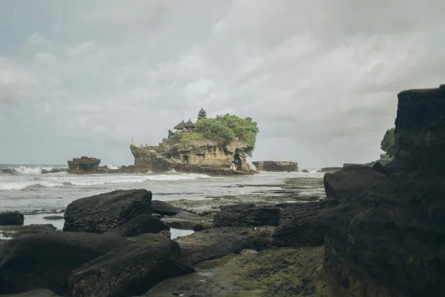 picturesque surrounded indonesia temple tanah trees ocean view bali lot and  1