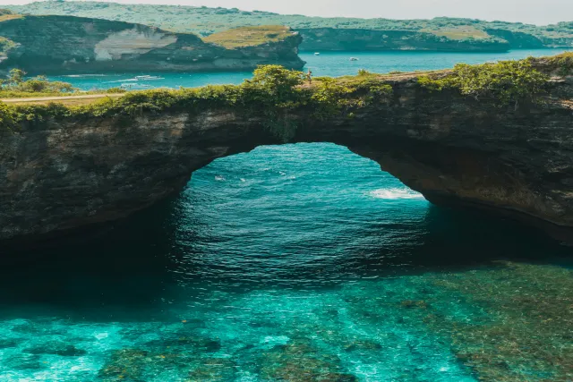 broken beach surrounded indonesia stunning coastal natural broken waters rugged cliffs be 1